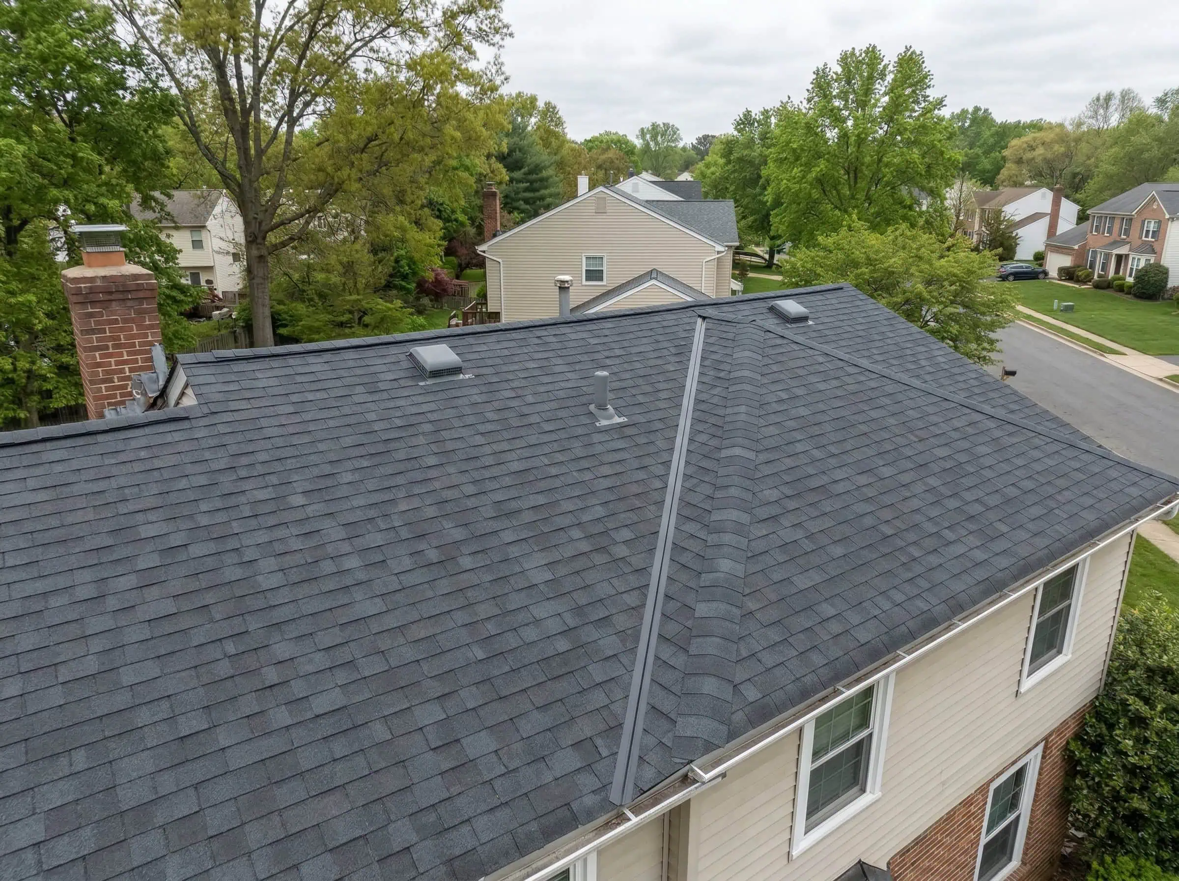 Springfield VA roof after Roof Maxx rejuvenation by DreamHome Remodeling — restored and extended life